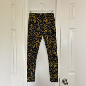 Navy LuLaRoe Leggings with Yellow Instrument Pattern